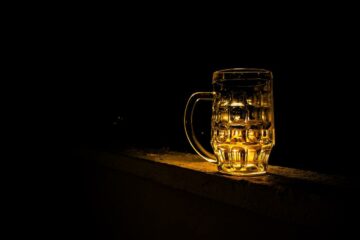 Beer lit from underneath in a glass
