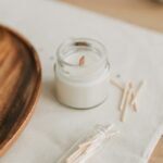 Close-Up Photo of Candle on Glass